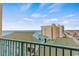 Scenic balcony view of the ocean and a beachfront building on a sunny day at 501 S Ocean Blvd. # 708, North Myrtle Beach, SC 29582