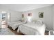 Inviting bedroom with two beds, light decor, and balcony access for relaxation at 501 S Ocean Blvd. # 708, North Myrtle Beach, SC 29582