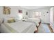 Bright bedroom featuring two beds, light-colored bedding, and access to a balcony at 501 S Ocean Blvd. # 708, North Myrtle Beach, SC 29582