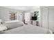 Serene bedroom with two beds, light decor, and a view to the outside balcony at 501 S Ocean Blvd. # 708, North Myrtle Beach, SC 29582