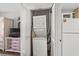 Convenient laundry closet with stacked washer and dryer at 501 S Ocean Blvd. # 708, North Myrtle Beach, SC 29582