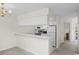 Kitchen with white cabinets and stainless steel appliances at 5060 Windsor Green Way # 203, Myrtle Beach, SC 29579