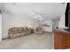 Living room with neutral decor and patio access at 5060 Windsor Green Way # 203, Myrtle Beach, SC 29579
