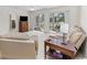 Spacious living room with patio access and view at 5060 Windsor Green Way # 203, Myrtle Beach, SC 29579