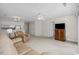 Living Room with beige couches and access to balcony at 5060 Windsor Green Way # 203, Myrtle Beach, SC 29579