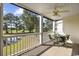 Relaxing screened porch overlooking a pond and golf course at 5060 Windsor Green Way # 203, Myrtle Beach, SC 29579