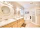 Elegant bathroom with double sinks, soaking tub, and separate shower at 508 5Th Ave. S, North Myrtle Beach, SC 29582