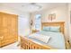 Charming bedroom with wooden furniture and window seat at 508 5Th Ave. S, North Myrtle Beach, SC 29582
