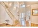 Bright and spacious entryway with hardwood floors and elegant staircase at 508 5Th Ave. S, North Myrtle Beach, SC 29582