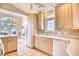 Kitchen boasts light wood cabinets, ample counter space, and a breakfast nook at 508 5Th Ave. S, North Myrtle Beach, SC 29582