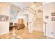 Bright living room with hardwood floors and staircase at 508 5Th Ave. S, North Myrtle Beach, SC 29582