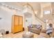 Light-filled living room with a cozy sitting area and built-in cabinet at 508 5Th Ave. S, North Myrtle Beach, SC 29582