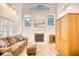 Spacious living room with a fireplace and large windows at 508 5Th Ave. S, North Myrtle Beach, SC 29582