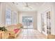 Sunroom with wicker furniture and access to outdoor patio at 508 5Th Ave. S, North Myrtle Beach, SC 29582
