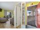 Entryway with beachy decor, showing access to living room and balcony at 600 S Ocean Blvd. # C-21, North Myrtle Beach, SC 29582