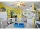 Bright kitchen with white appliances and light-colored cabinets at 600 S Ocean Blvd. # C-21, North Myrtle Beach, SC 29582