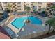 Inviting community pool with surrounding patio furniture at 600 S Ocean Blvd. # C-21, North Myrtle Beach, SC 29582