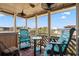 Relaxing screened balcony with comfortable seating and ocean view at 600 S Ocean Blvd. # C-21, North Myrtle Beach, SC 29582