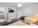 Well-lit bedroom with twin beds and a dresser at 601 Mitchell Dr. # 1002, Myrtle Beach, SC 29577