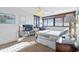 Comfortable bedroom with a queen-size bed and plenty of natural light at 601 Mitchell Dr. # 1002, Myrtle Beach, SC 29577