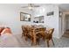 Dining area with wicker chairs and glass-top table at 601 Mitchell Dr. # 1002, Myrtle Beach, SC 29577