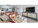 Living room with sofa, coffee table, and TV at 601 Mitchell Dr. # 1002, Myrtle Beach, SC 29577