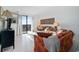 Living room with sofa, balcony access, and ocean view at 601 Mitchell Dr. # 1002, Myrtle Beach, SC 29577