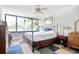 Spacious bedroom with metal bed frame and ample natural light at 7601 North Ocean Blvd. # 1B, Myrtle Beach, SC 29572