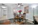 Bright dining area with table and chairs, view into kitchen at 7601 North Ocean Blvd. # 1B, Myrtle Beach, SC 29572