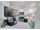 White kitchen with black appliances and a coffee bar at 7601 North Ocean Blvd. # 1B, Myrtle Beach, SC 29572