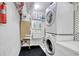 Convenient laundry room with washer, dryer, and utility sink at 7601 North Ocean Blvd. # 1B, Myrtle Beach, SC 29572