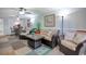 Open living space with comfortable seating and view of dining area at 7601 North Ocean Blvd. # 1B, Myrtle Beach, SC 29572
