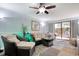 Relaxing living room featuring wicker furniture and sliding glass doors at 7601 North Ocean Blvd. # 1B, Myrtle Beach, SC 29572