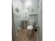 Small bathroom with pedestal sink and nautical decor at 1000 N Waccamaw Dr. # 302, Murrells Inlet, SC 29576