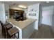 Kitchen with stainless steel appliances and breakfast bar at 1000 N Waccamaw Dr. # 302, Murrells Inlet, SC 29576