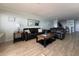 Living room with two leather sofas, coffee table, and light flooring at 1000 N Waccamaw Dr. # 302, Murrells Inlet, SC 29576