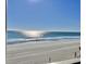 Ocean and beach view from a condo at 1000 N Waccamaw Dr. # 302, Murrells Inlet, SC 29576