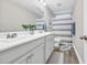Bright bathroom featuring a double vanity, modern fixtures, and a shower-tub combo at 104 Grace Bay Ct., Pawleys Island, SC 29585