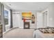 Inviting bedroom with a decorative fireplace, soft carpet, and ample natural light at 104 Grace Bay Ct., Pawleys Island, SC 29585