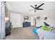 Bright bedroom with neutral walls, carpet, ceiling fan and playful accents at 104 Grace Bay Ct., Pawleys Island, SC 29585