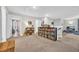 Versatile living area with built-in bookshelves, a cozy reading nook, and ample space for entertaining at 104 Grace Bay Ct., Pawleys Island, SC 29585