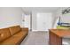Spacious room with sofa, closet and neutral walls and carpet at 104 Grace Bay Ct., Pawleys Island, SC 29585
