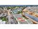Aerial view featuring tennis courts, parking, and waterways within the community at 1100 Possum Trot Rd. # E-238, North Myrtle Beach, SC 29582