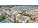 Aerial view showcasing community pool, complex, and surrounding landscape at 1100 Possum Trot Rd. # E-238, North Myrtle Beach, SC 29582