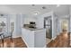 Compact kitchen adjacent to the dining area with stainless steel appliances at 1100 Possum Trot Rd. # E-238, North Myrtle Beach, SC 29582