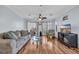 Inviting living room featuring a ceiling fan and sliding glass doors to the patio at 1100 Possum Trot Rd. # E-238, North Myrtle Beach, SC 29582