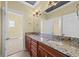 Double vanity bathroom with granite countertop and wood cabinets at 1122 Bluffton Ct., Myrtle Beach, SC 29579