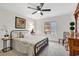 Bedroom with a queen bed, side tables, and a window at 1165 Carnoustie Ct., Myrtle Beach, SC 29575