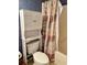 Bathroom with toilet, shower/tub, and linen cabinet at 121 Marshland Ct., Myrtle Beach, SC 29572