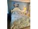 Bedroom with double bed and ocean-themed decor at 121 Marshland Ct., Myrtle Beach, SC 29572